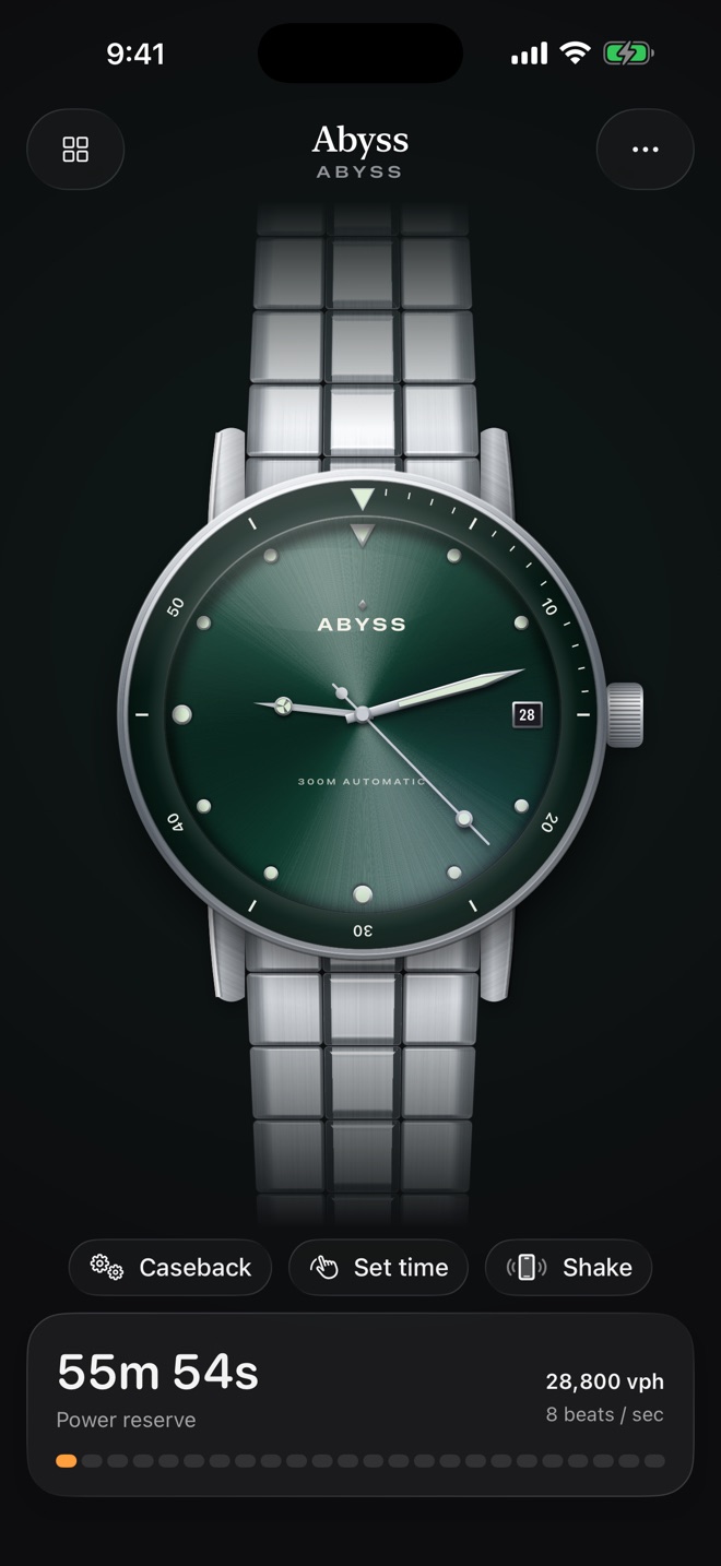 Abyss, a green diver on a steel bracelet